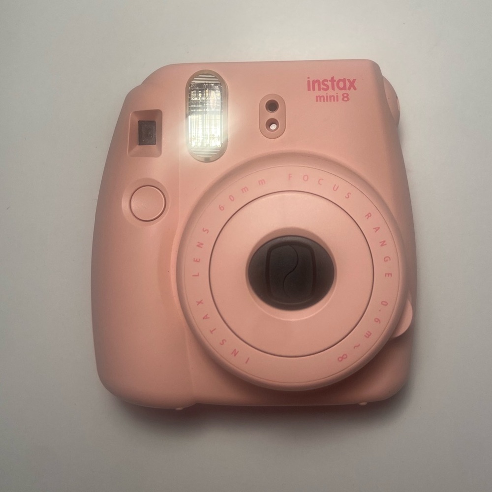 pink polaroid camera